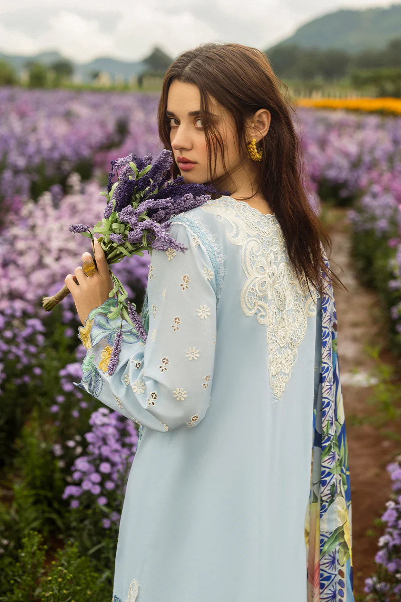 Model wearing pastel blue Hidden Oasis dress from Mushq Secret Garden Spring/Summer '25, Pakistani Luxury pret, Pakistani clothes online in UK.