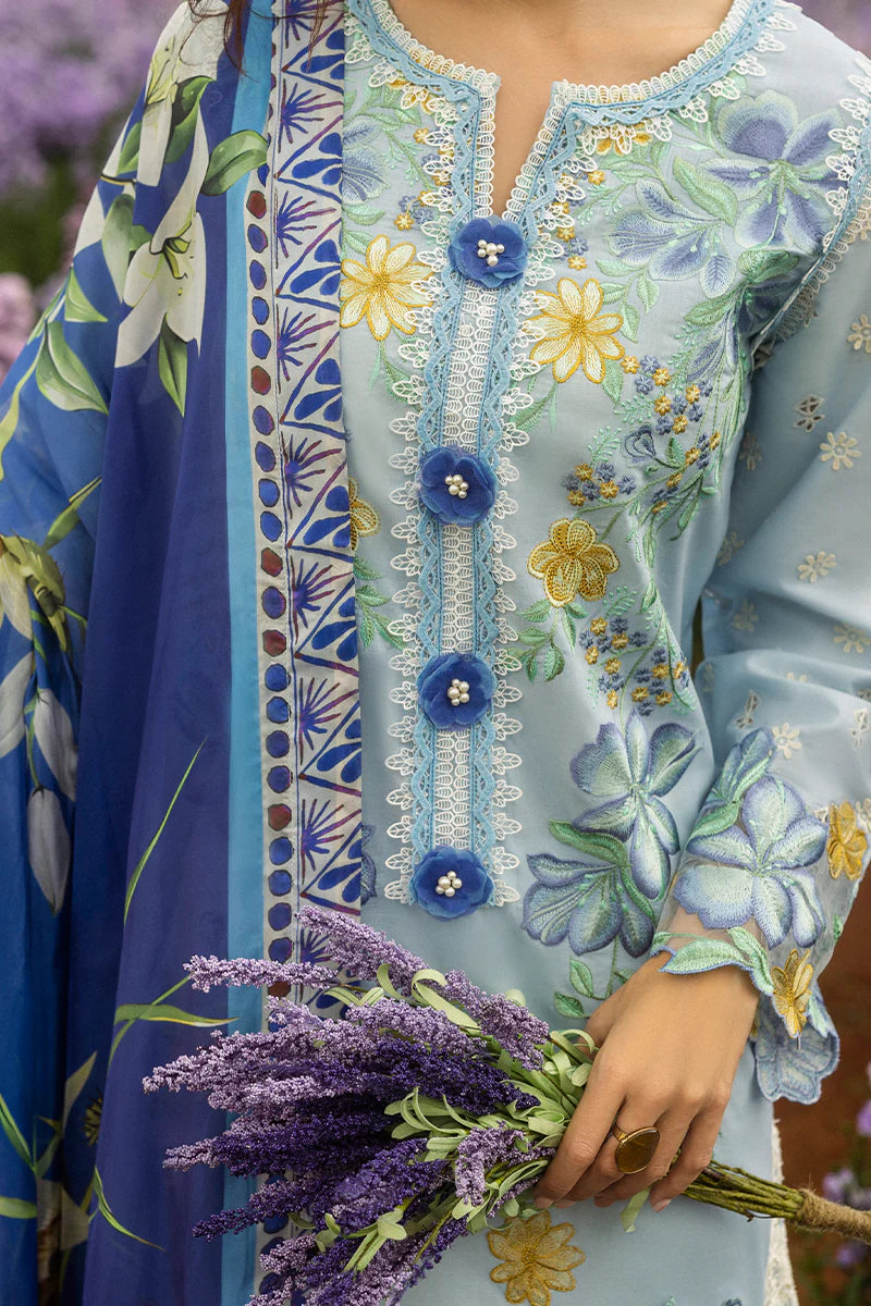 Model wearing pastel blue Hidden Oasis dress from Mushq Secret Garden Spring/Summer '25, Pakistani Luxury pret, Pakistani clothes online in UK.