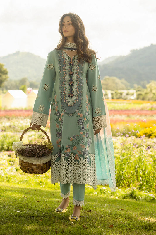 Model wearing orange Silent Petals dress from Mushq Secret Garden Spring/Summer '25, Pakistani Luxury pret, Pakistani clothes online in UK.