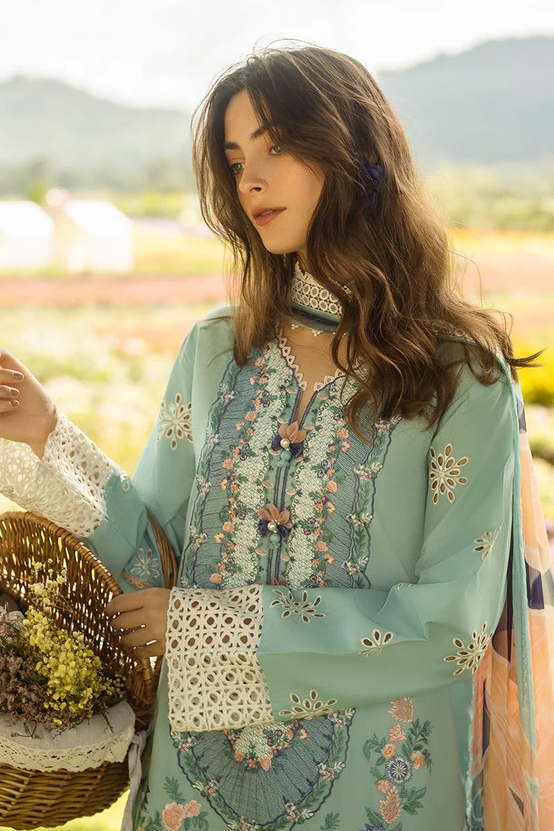Model wearing orange Silent Petals dress from Mushq Secret Garden Spring/Summer '25, Pakistani Luxury pret, Pakistani clothes online in UK.