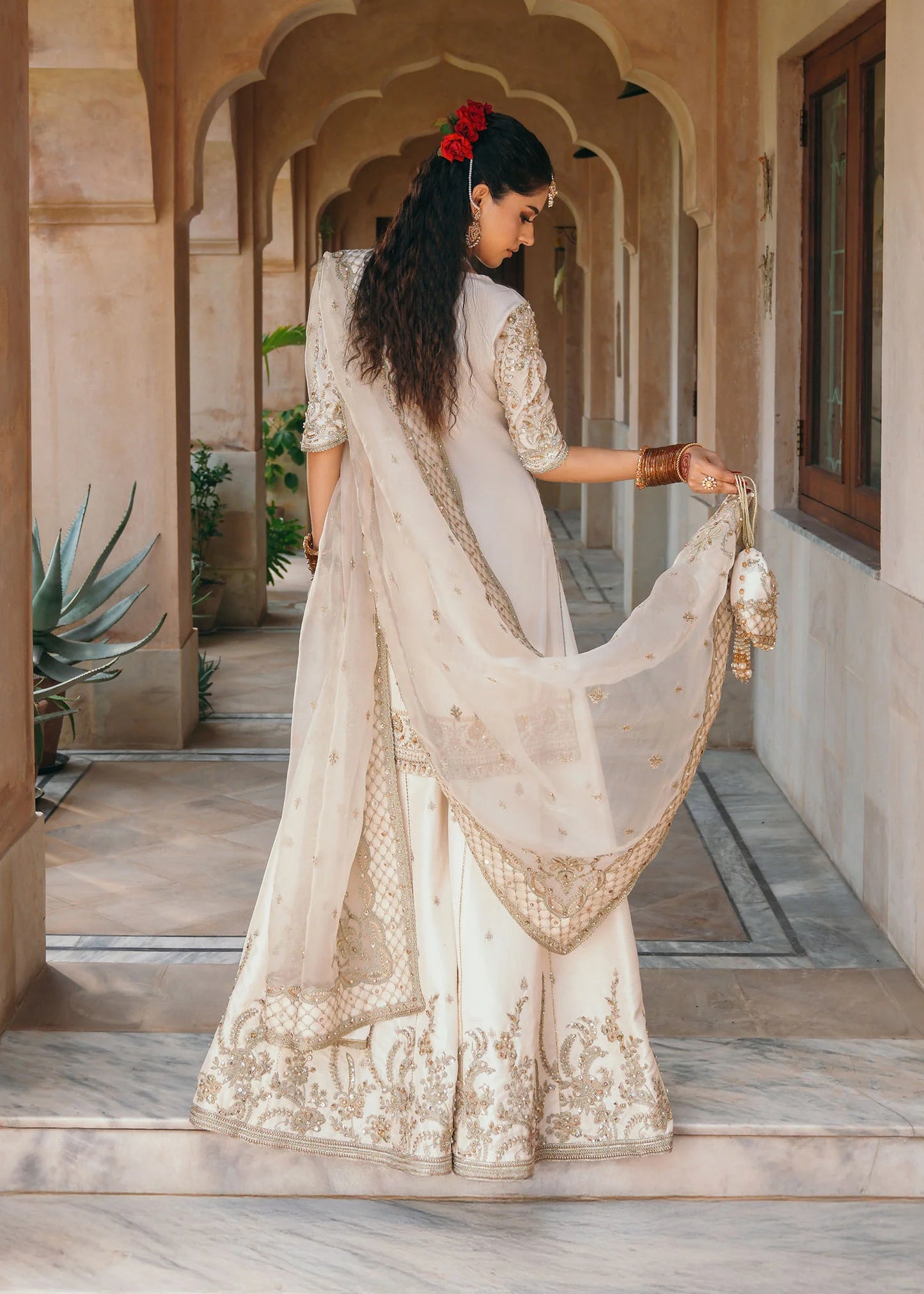 Model wearing Jaya by Kanwal Malik in ivory with gold embellishments – timeless Pakistani luxury pret outfit in UK.