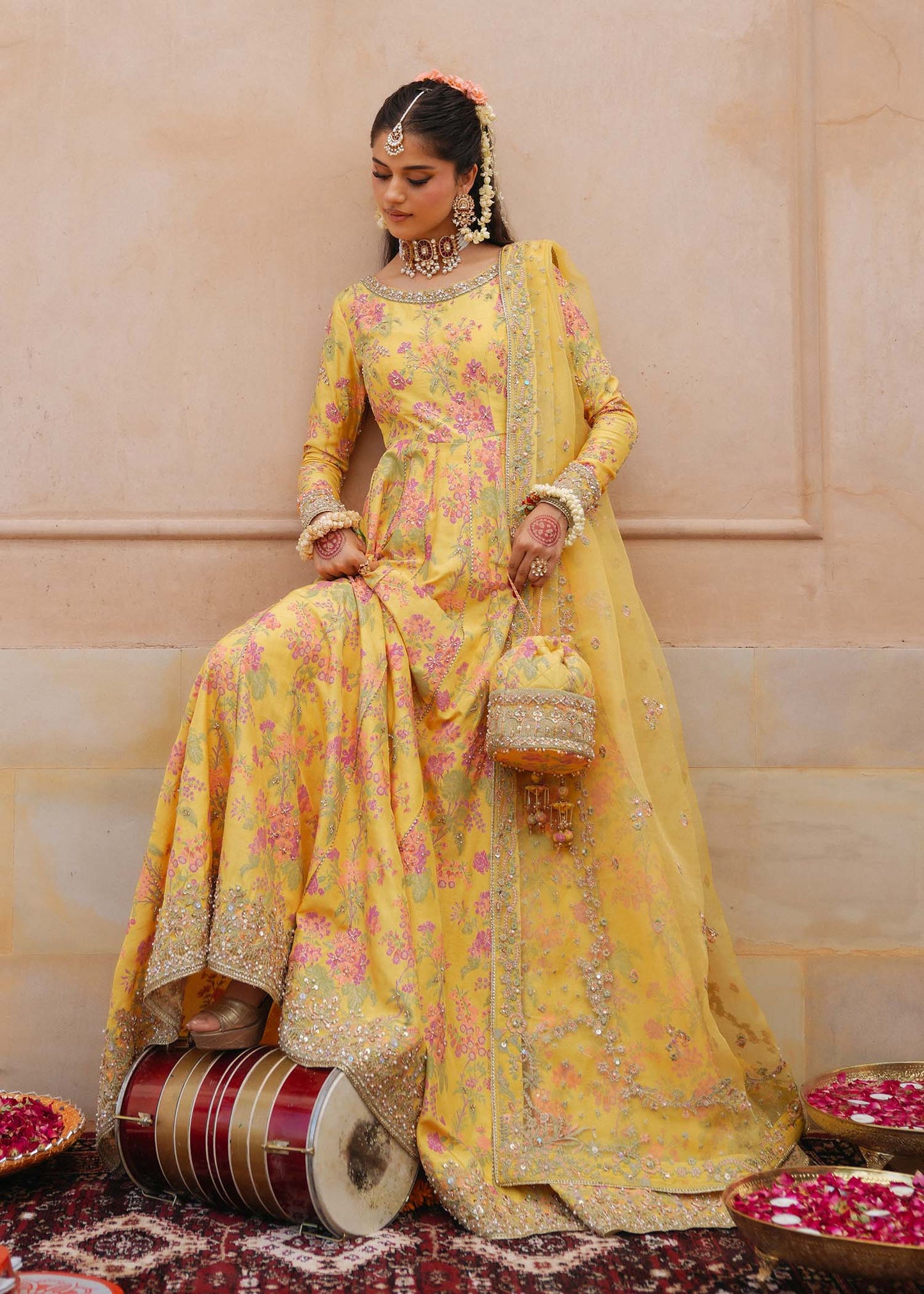 Model wearing Hoorain by Kanwal Malik in vibrant yellow with floral embroidery – festive Pakistani luxury pret outfit in UK.