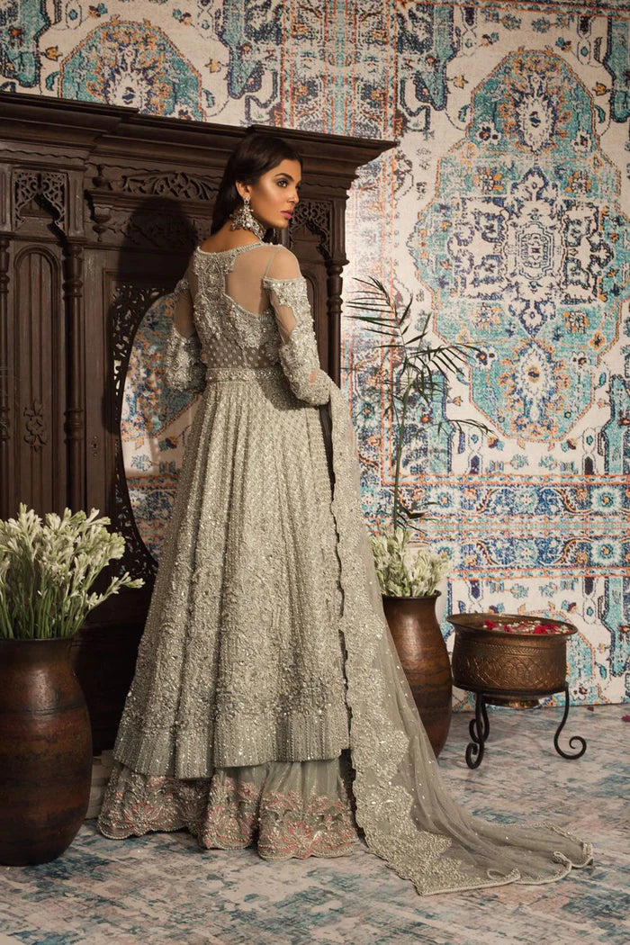 Model wearing Saira Rizwan Wedding Bridals Seemal dress, Pakistani clothes online in UK.