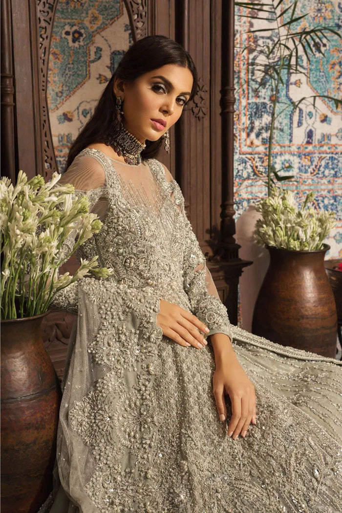 Model wearing Saira Rizwan Wedding Bridals Seemal dress, Pakistani clothes online in UK.