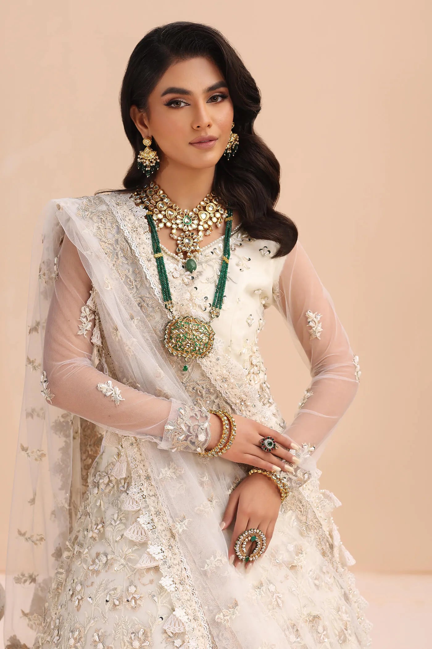 Model in Musferah Saad Ivory Elegance white Pakistani wedding dress, UK.