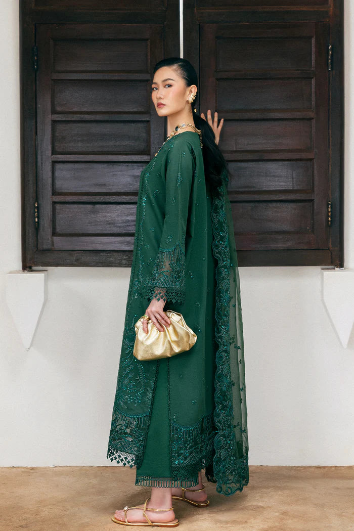 Model wearing emerald green Saira Rizwan CLAIR SREP08-25 from Sajri Eid Pret '25, Pakistani luxury pret outfit available online in UK.