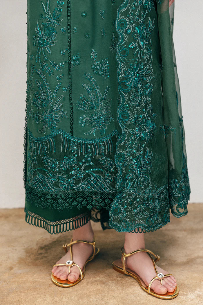 Model wearing emerald green Saira Rizwan CLAIR SREP08-25 from Sajri Eid Pret '25, Pakistani luxury pret outfit available online in UK.