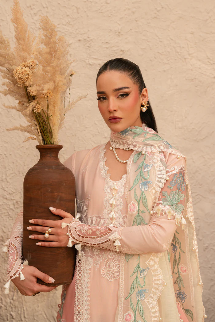 Model wearing soft peach embroidered dress with floral organza dupatta from Saira Rizwan, Pakistani luxury pret, Pakistani clothes online in UK.