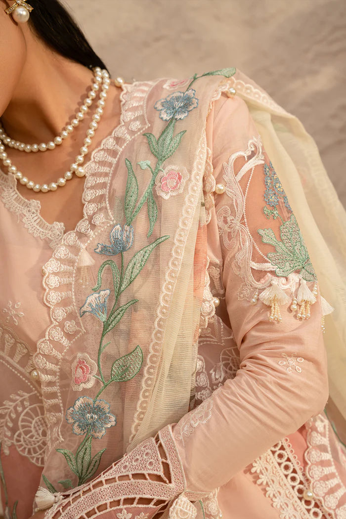 Model wearing soft peach embroidered dress with floral organza dupatta from Saira Rizwan, Pakistani luxury pret, Pakistani clothes online in UK.