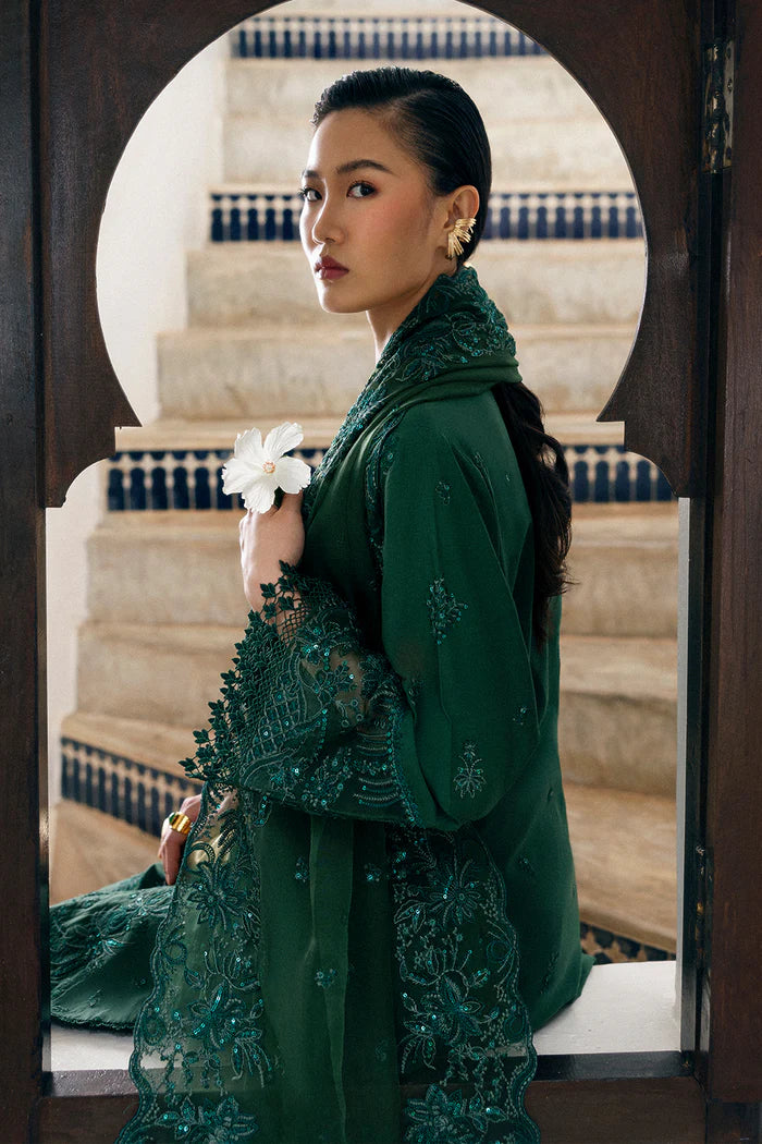 Model wearing emerald green Saira Rizwan CLAIR SREP08-25 from Sajri Eid Pret '25, Pakistani luxury pret outfit available online in UK.