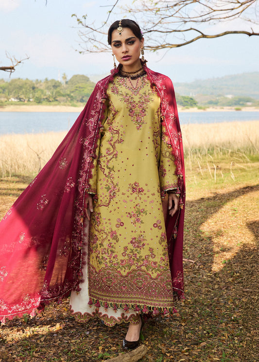 Model wearing Hussain Rehar Luxury Lawn '25 Minted in mustard with maroon embroidery. Shop Pakistani luxury pret online in the UK.