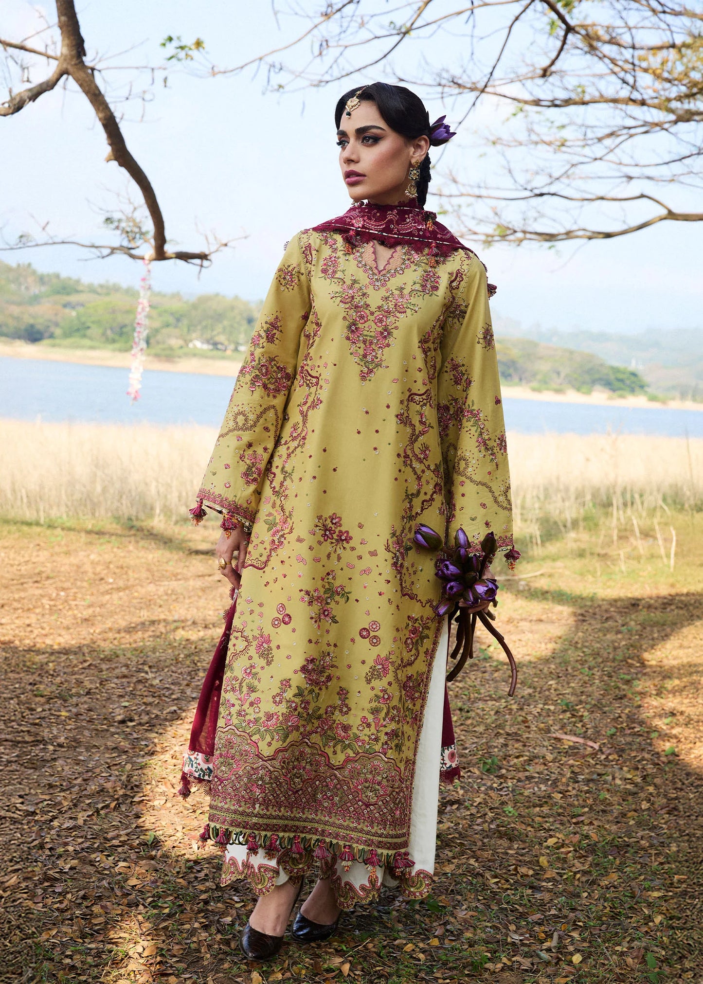 Model wearing Hussain Rehar Luxury Lawn '25 Minted in mustard with maroon embroidery. Shop Pakistani luxury pret online in the UK.