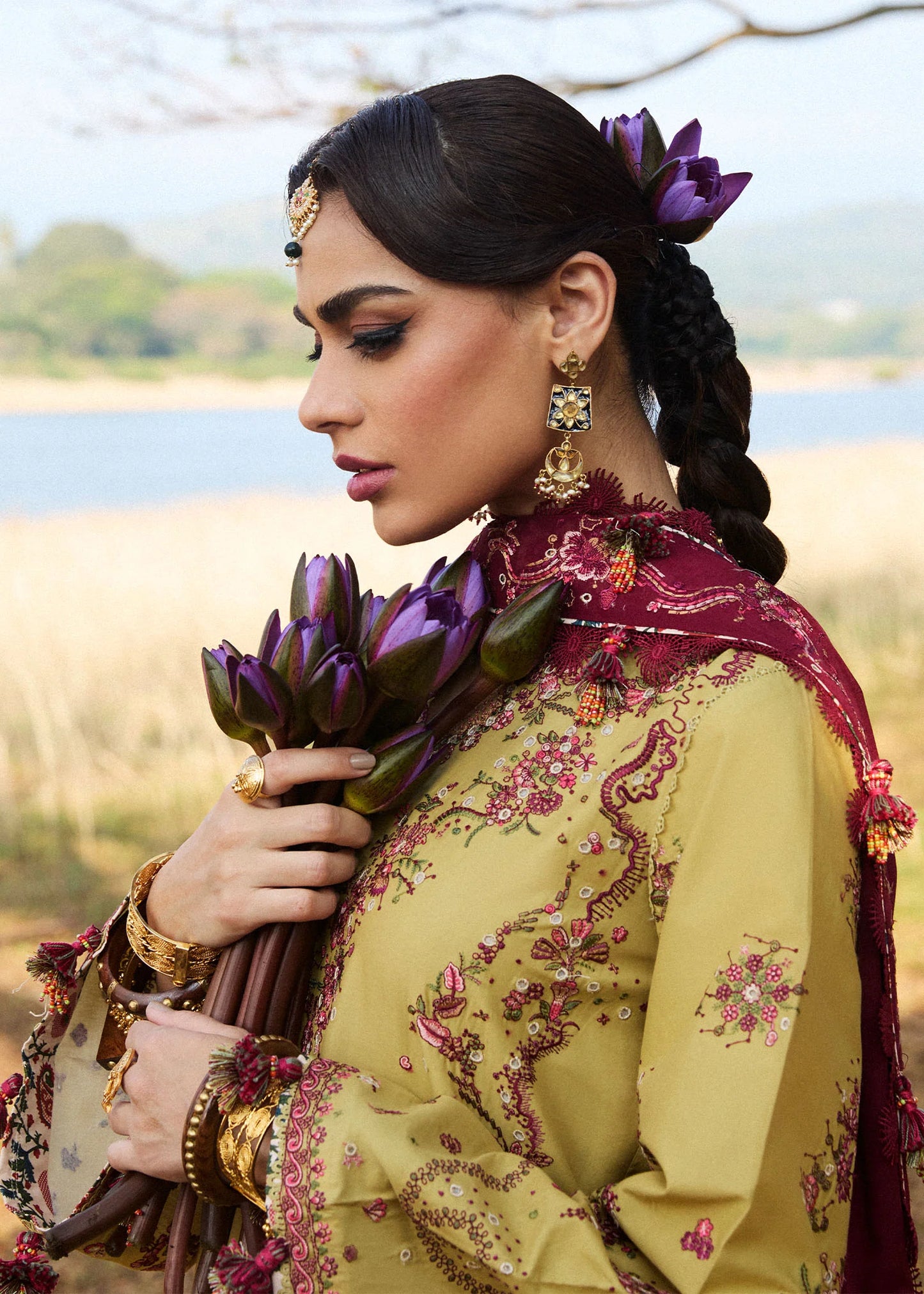 Model wearing Hussain Rehar Luxury Lawn '25 Minted in mustard with maroon embroidery. Shop Pakistani luxury pret online in the UK.