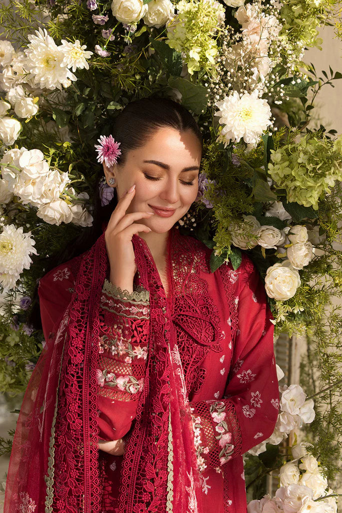 Model wearing Sobia Nazir Design 14A deep red luxury lawn dress with floral embroidery. Shop Pakistani clothes online in the UK for casual and festive wear.