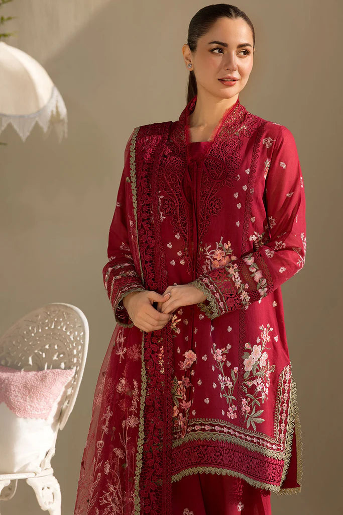 Model wearing Sobia Nazir Design 14A deep red luxury lawn dress with floral embroidery. Shop Pakistani clothes online in the UK for casual and festive wear.