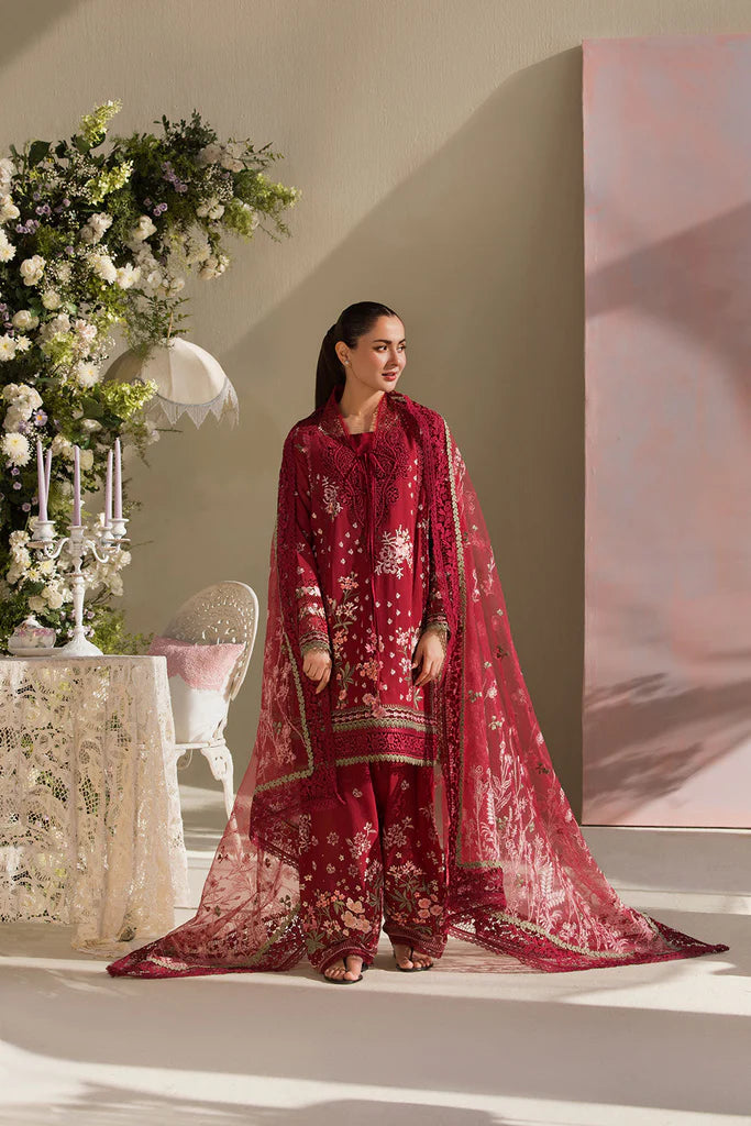 Model wearing Sobia Nazir Design 14A deep red luxury lawn dress with floral embroidery. Shop Pakistani clothes online in the UK for casual and festive wear.