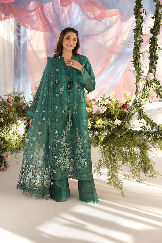 Model wearing Sobia Nazir Design 15B green luxury lawn dress with delicate embroidery. Shop Pakistani clothes online in the UK for casual and festive wear.