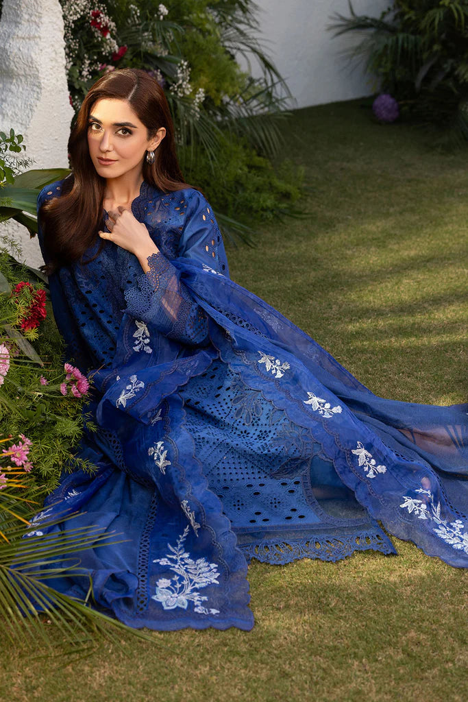 Model wearing Sobia Nazir Design 1B navy blue luxury lawn dress. Shop Pakistani clothes online in the UK for summer casual and festive wear.