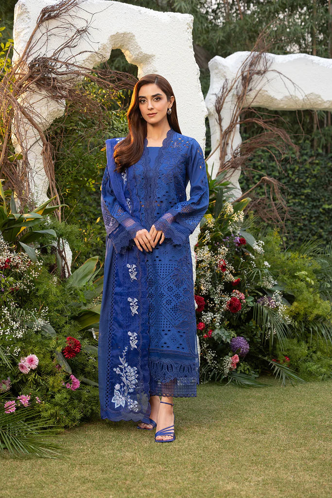 Model wearing Sobia Nazir Design 1B navy blue luxury lawn dress. Shop Pakistani clothes online in the UK for summer casual and festive wear.