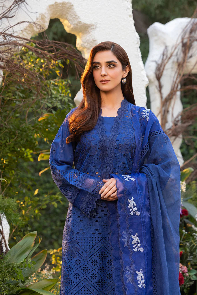 Model wearing Sobia Nazir Design 1B navy blue luxury lawn dress. Shop Pakistani clothes online in the UK for summer casual and festive wear.