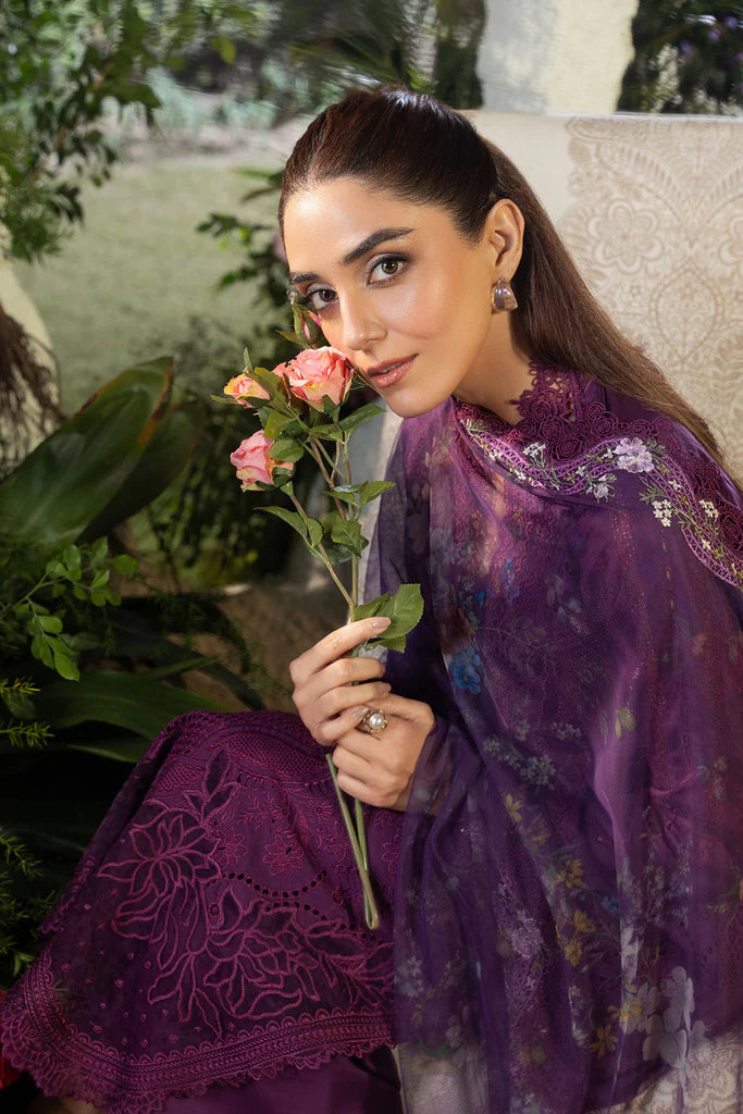 Model wearing Sobia Nazir Design 2B deep purple luxury lawn dress with intricate embroidery. Shop Pakistani clothes online in the UK for casual and festive wear.