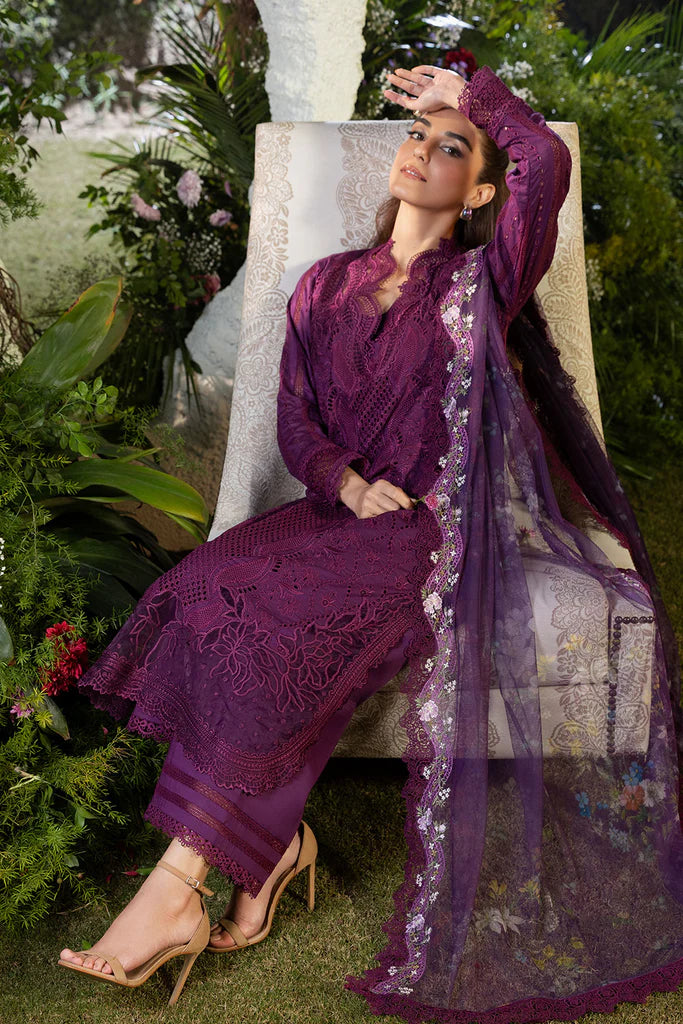 Model wearing Sobia Nazir Design 2B deep purple luxury lawn dress with intricate embroidery. Shop Pakistani clothes online in the UK for casual and festive wear.