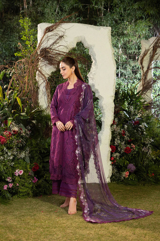 Model wearing Sobia Nazir Design 2B deep purple luxury lawn dress with intricate embroidery. Shop Pakistani clothes online in the UK for casual and festive wear.