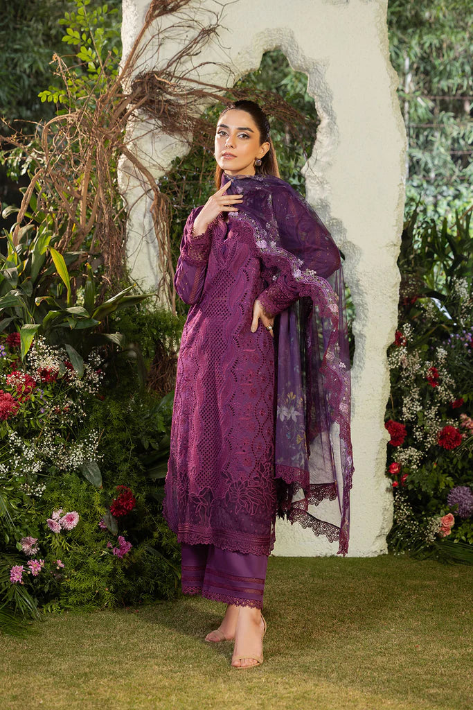 Model wearing Sobia Nazir Design 2B deep purple luxury lawn dress with intricate embroidery. Shop Pakistani clothes online in the UK for casual and festive wear.