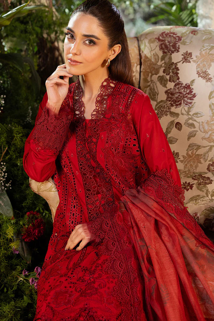 Model wearing Sobia Nazir Design 3A deep red luxury lawn dress with intricate embroidery. Shop Pakistani clothes online in the UK for casual and festive wear.