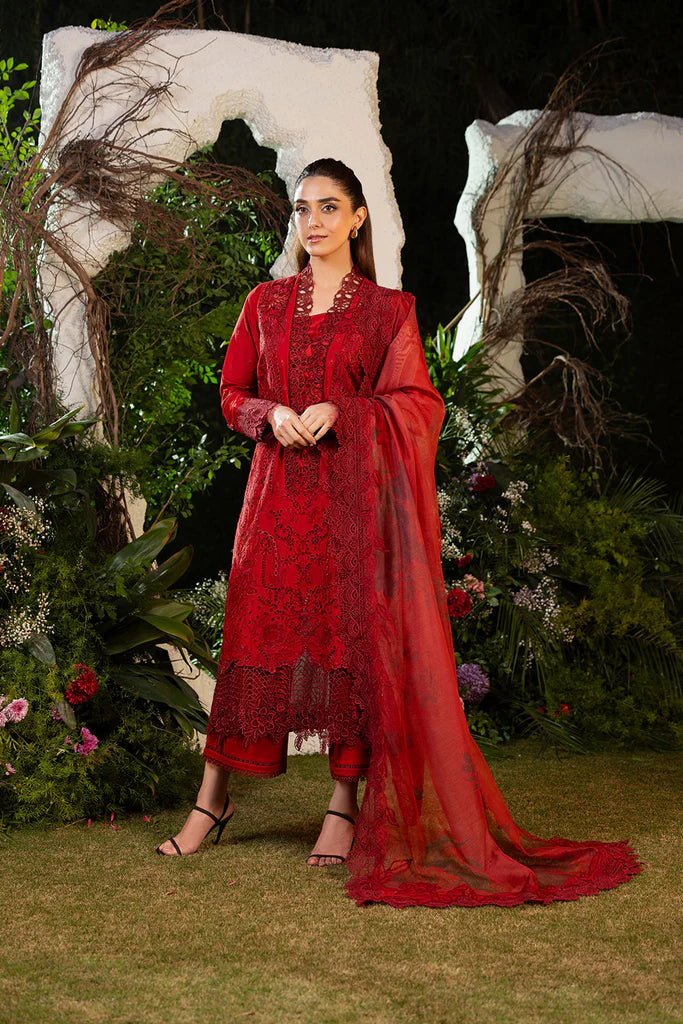 Model wearing Sobia Nazir Design 3A deep red luxury lawn dress with intricate embroidery. Shop Pakistani clothes online in the UK for casual and festive wear.