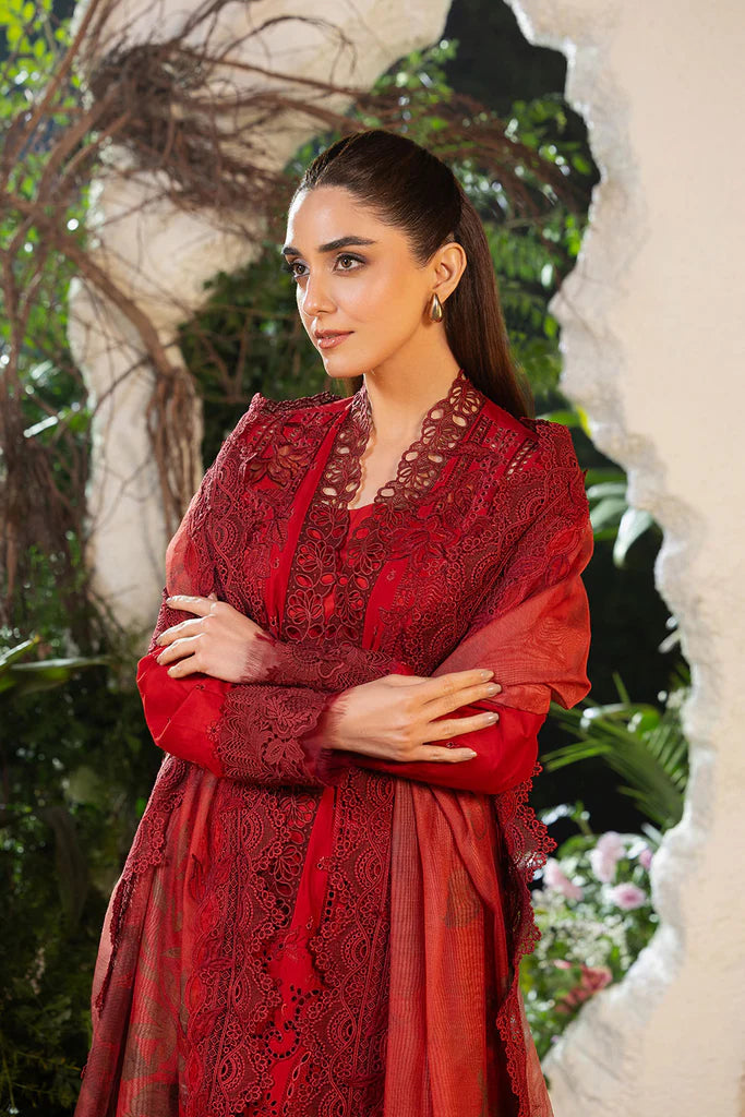 Model wearing Sobia Nazir Design 3A deep red luxury lawn dress with intricate embroidery. Shop Pakistani clothes online in the UK for casual and festive wear.