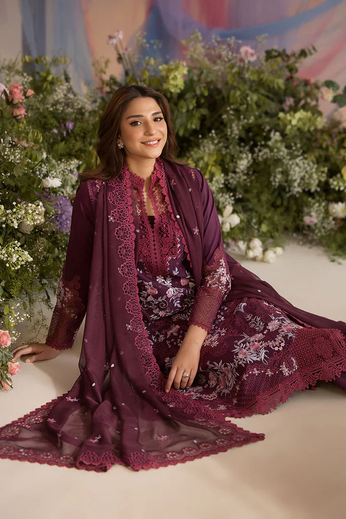 Model wearing Sobia Nazir Design 6A deep plum luxury lawn dress. Shop Pakistani clothes online in the UK for summer casual and festive wear.