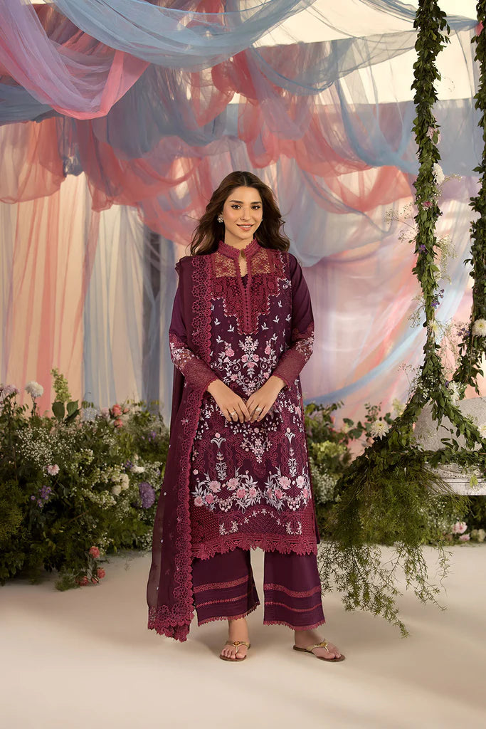 Model wearing Sobia Nazir Design 6A deep plum luxury lawn dress. Shop Pakistani clothes online in the UK for summer casual and festive wear.