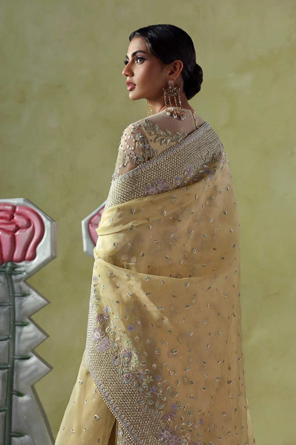Model wearing Liora by Soraya in soft mustard embellished saree – Pakistani luxury pret ideal for weddings, shop Pakistani clothes online in UK.