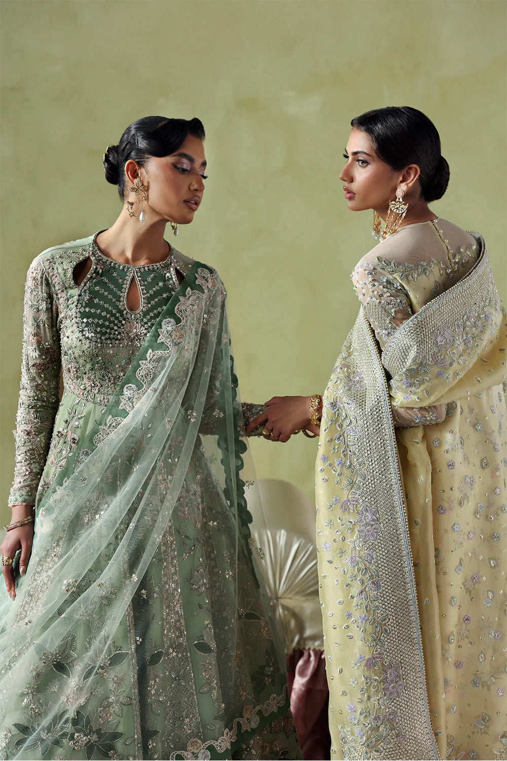 Model wearing Lirien by Soraya in pistachio green with intricate embroidery – Pakistani luxury pret, shop Pakistani clothes online in UK.
