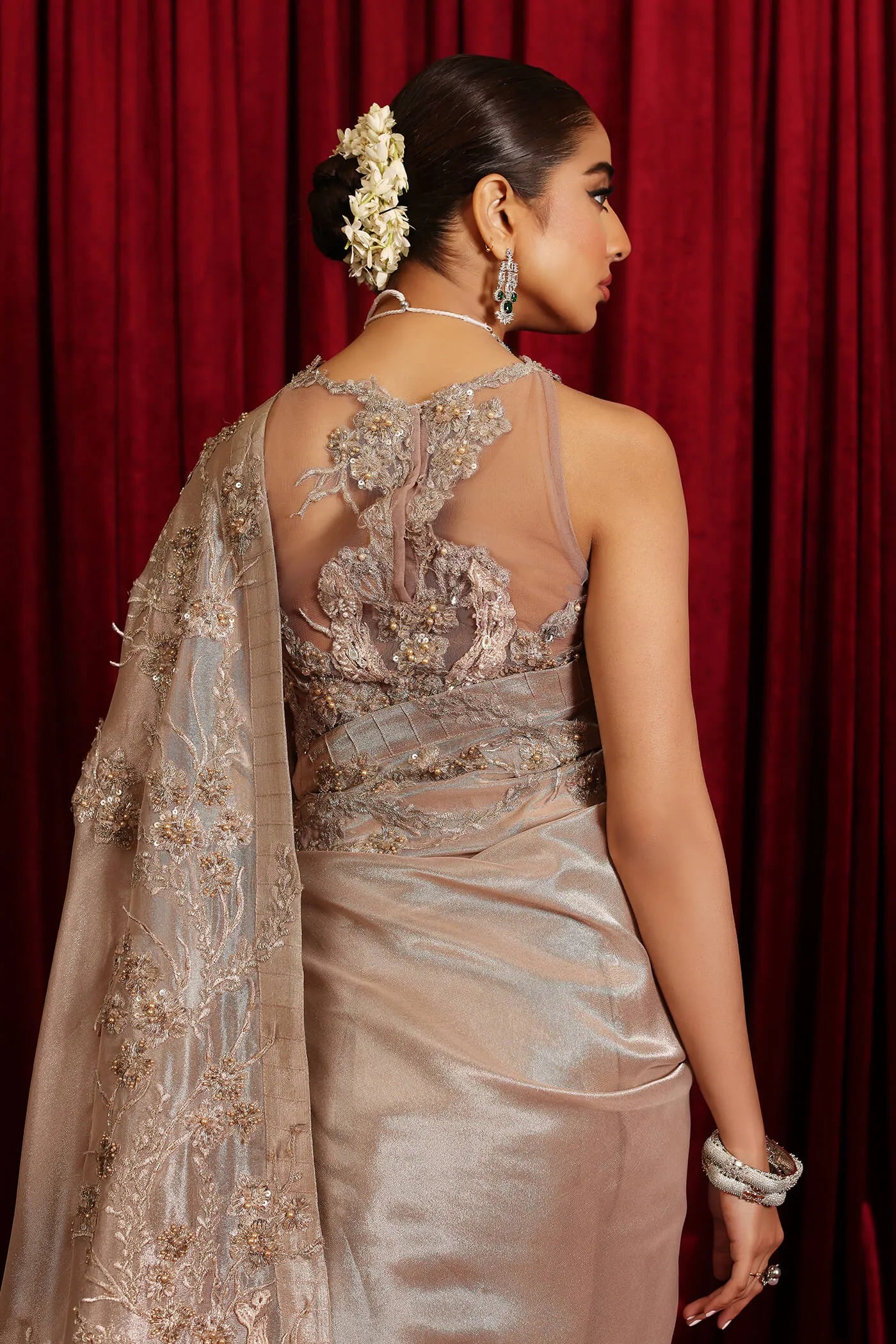 Model in Musferah Saad Royal Flair, an elegant rose gold Pakistani bridal dress, UK.