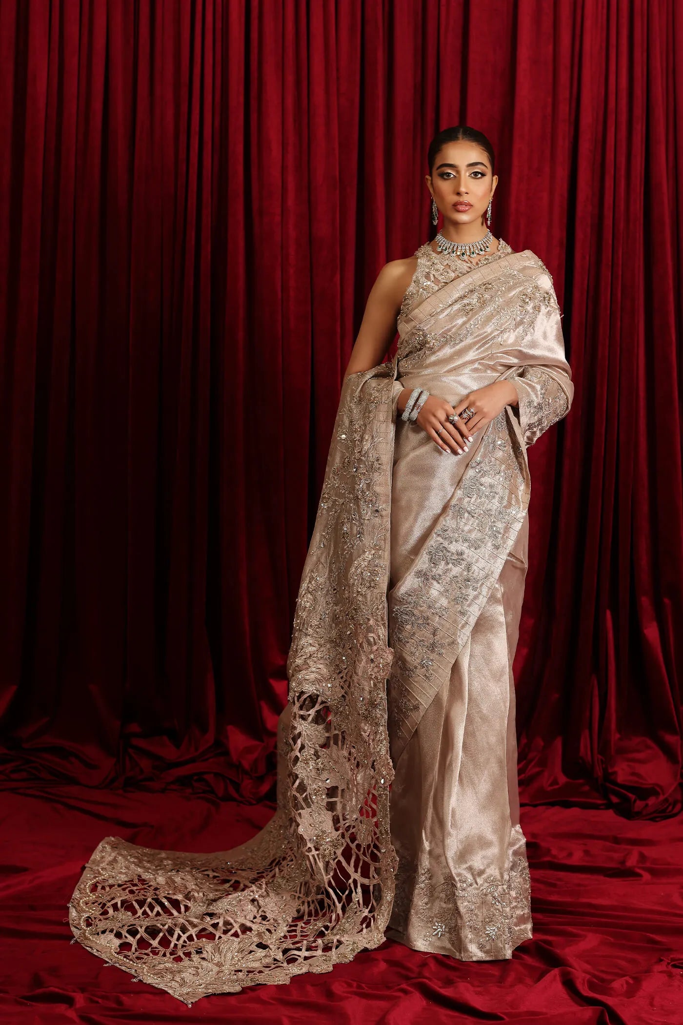 Model in Musferah Saad Royal Flair, an elegant rose gold Pakistani bridal dress, UK.