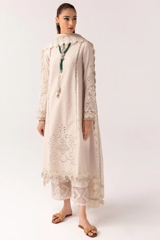 Model wearing ivory embroidered dress from Qalamkar Basic Pret '25 KT-03 Naire, Saffron Pakistani Luxury pret available online in UK.