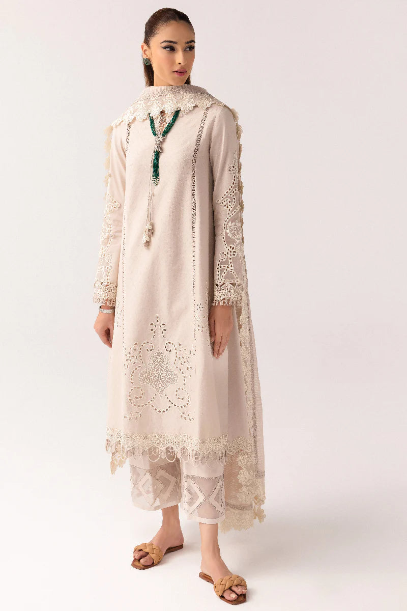 Model wearing ivory embroidered dress from Qalamkar Basic Pret '25 KT-03 Naire, Saffron Pakistani Luxury pret available online in UK.
