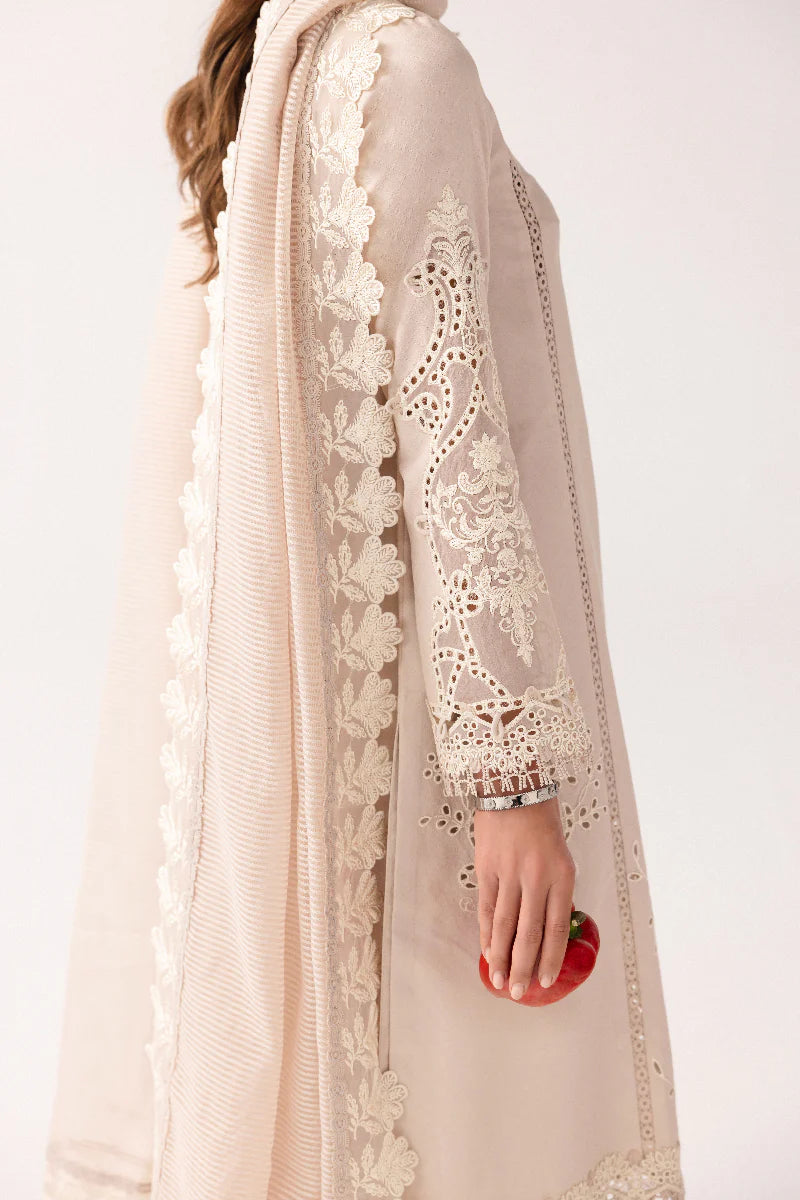 Model wearing ivory embroidered dress from Qalamkar Basic Pret '25 KT-03 Naire, Saffron Pakistani Luxury pret available online in UK.