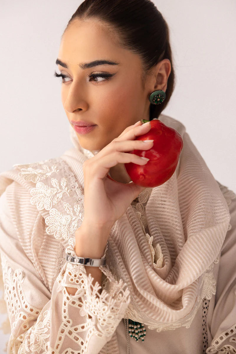 Model wearing ivory embroidered dress from Qalamkar Basic Pret '25 KT-03 Naire, Saffron Pakistani Luxury pret available online in UK.