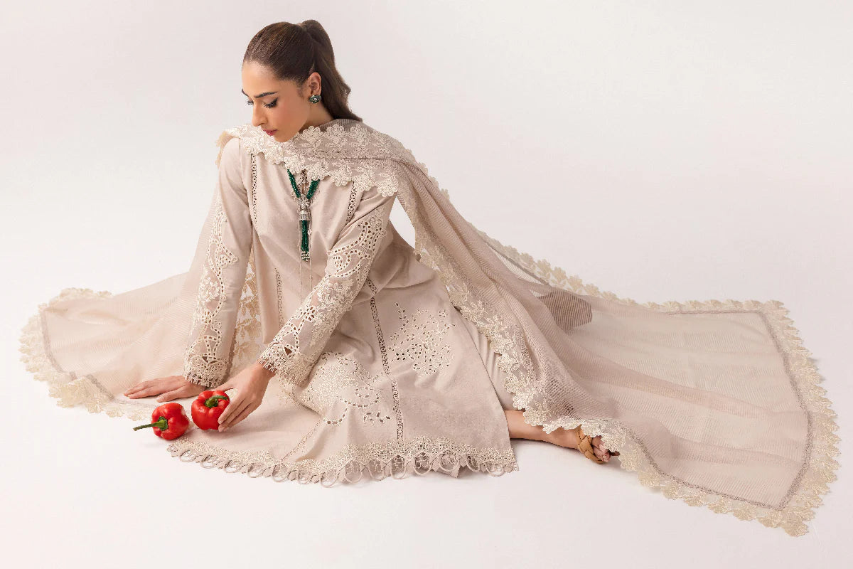 Model wearing ivory embroidered dress from Qalamkar Basic Pret '25 KT-03 Naire, Saffron Pakistani Luxury pret available online in UK.