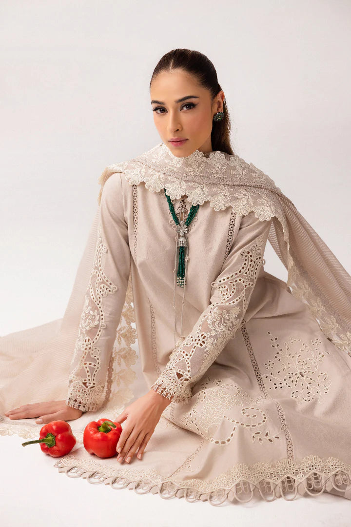 Model wearing ivory embroidered dress from Qalamkar Basic Pret '25 KT-03 Naire, Saffron Pakistani Luxury pret available online in UK.