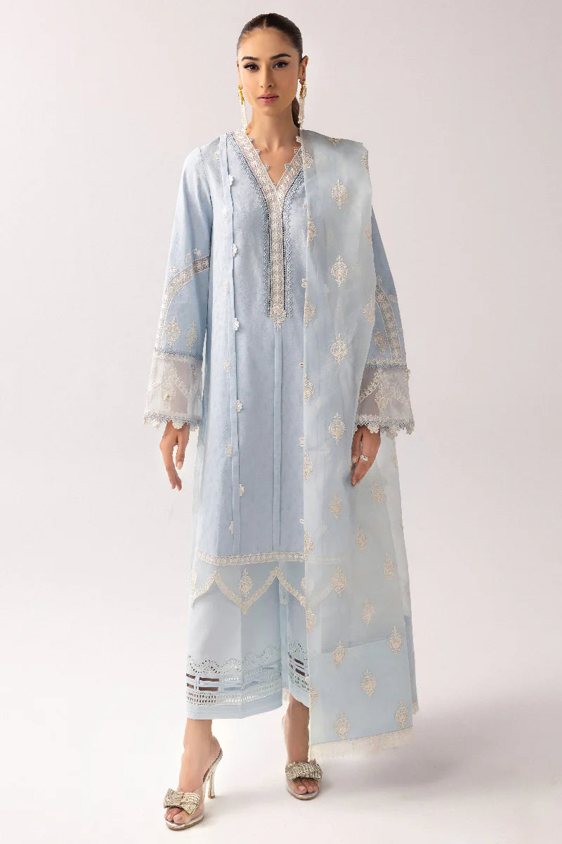 Model wearing powder blue embroidered dress from Qalamkar Basic Pret '25 KT-04 Wardah, Saffron Pakistani Luxury pret online in UK.