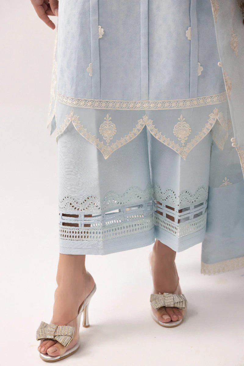 Model wearing powder blue embroidered dress from Qalamkar Basic Pret '25 KT-04 Wardah, Saffron Pakistani Luxury pret online in UK.