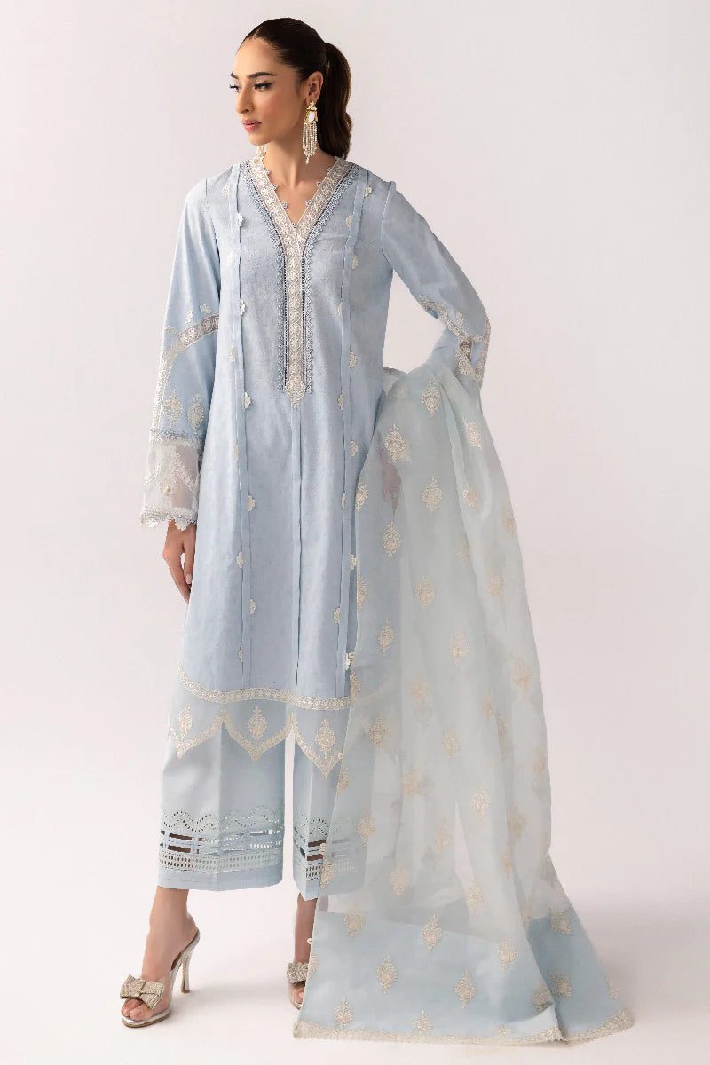Model wearing powder blue embroidered dress from Qalamkar Basic Pret '25 KT-04 Wardah, Saffron Pakistani Luxury pret online in UK.