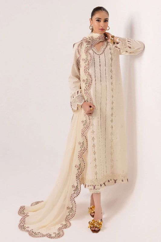 Model wearing ivory embroidered dress from Qalamkar Basic Pret '25 KT-01 Lverah, Saffron Pakistani Luxury pret available online in UK.
