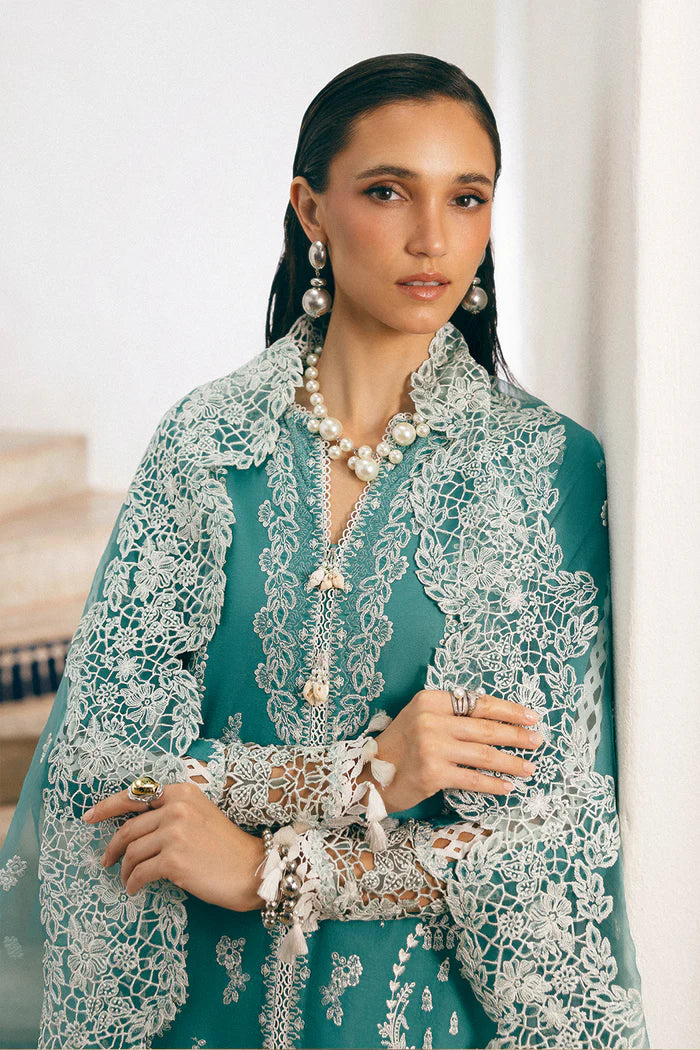 Model wearing teal Saira Rizwan REVE SREP05-25 from Sajri Eid Pret '25, Pakistani luxury pret outfit available online in UK.
