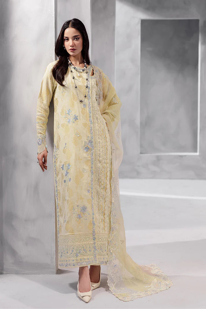 Model wearing pastel yellow Aymber from Mushq La Toscana Casual Pret '25, Pakistani luxury pret and Pakistani clothes online in UK.