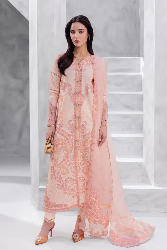 Model wearing peach pink Mitchelle from Mushq La Toscana Casual Pret '25, Pakistani luxury pret and Pakistani clothes online in UK.